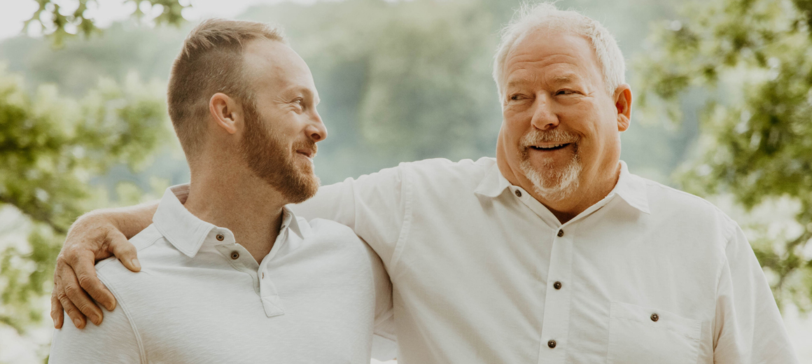 Rick and Sean Sparkman together outdoors